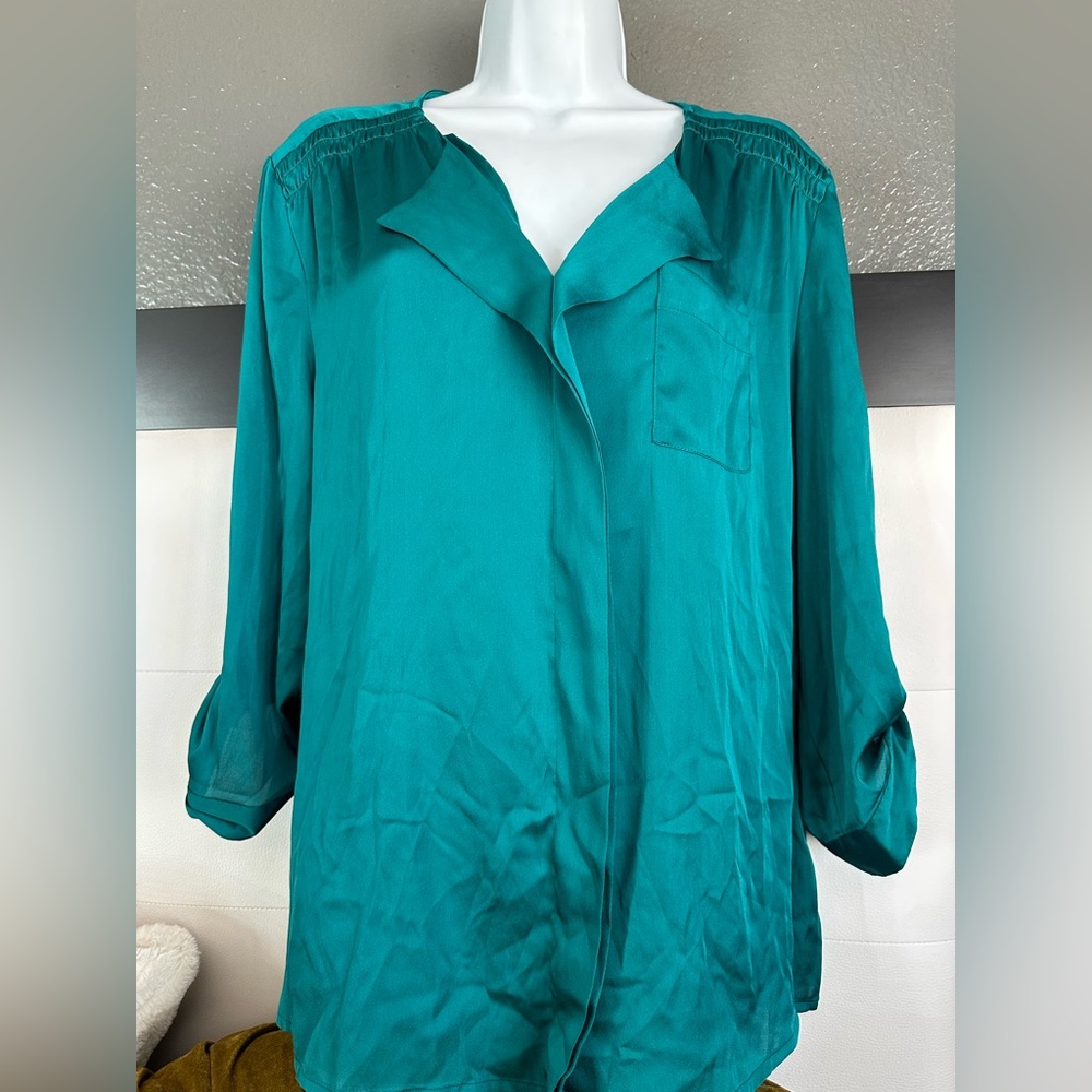 The limited green silky blouse sz XL